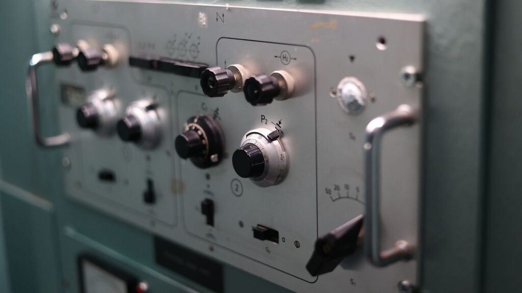 Close-up of industrial machine switches representing Titania DIP switch configuration and commissioning